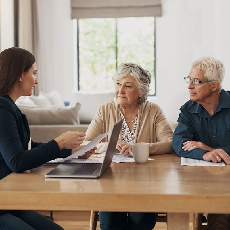 older couple meeting with an estate planning attorney in Roseville, CA