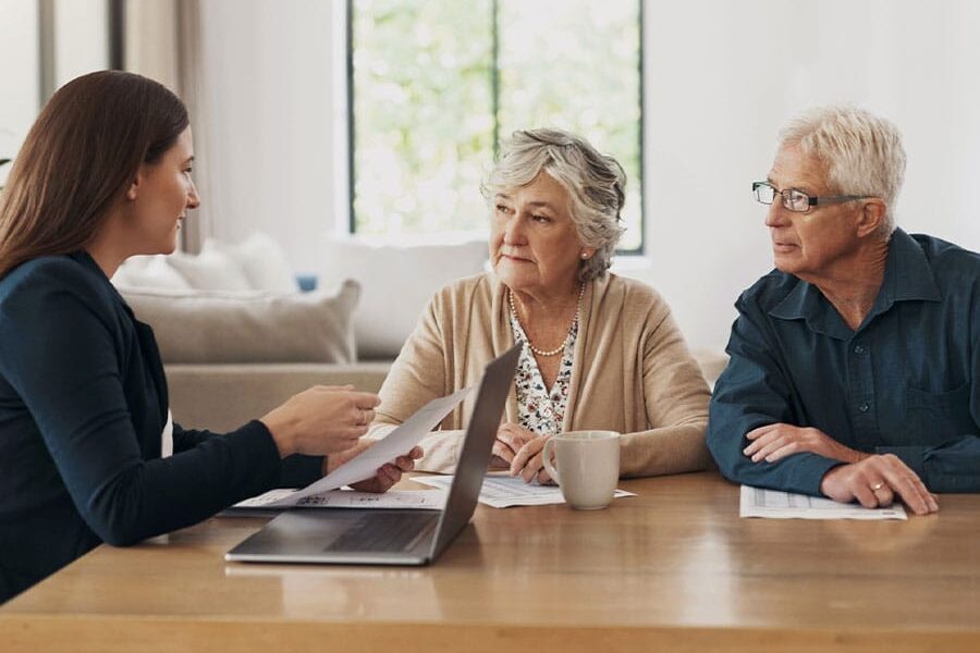 older couple meeting with an estate planning attorney in Roseville, CA